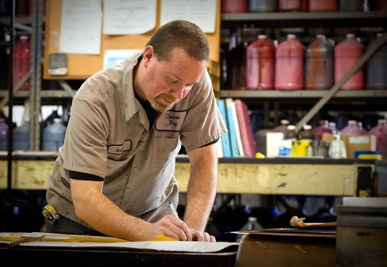 Custom Poly Packaging Team Member Working Custom Poly Packaging Team Member Working