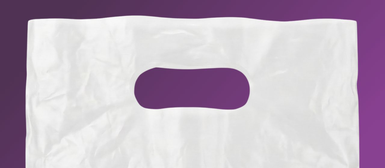 Die Cut Handle Opening Close-up of the oval handle opening cut into a white poly die cut handle bag from Custom Poly Packaging