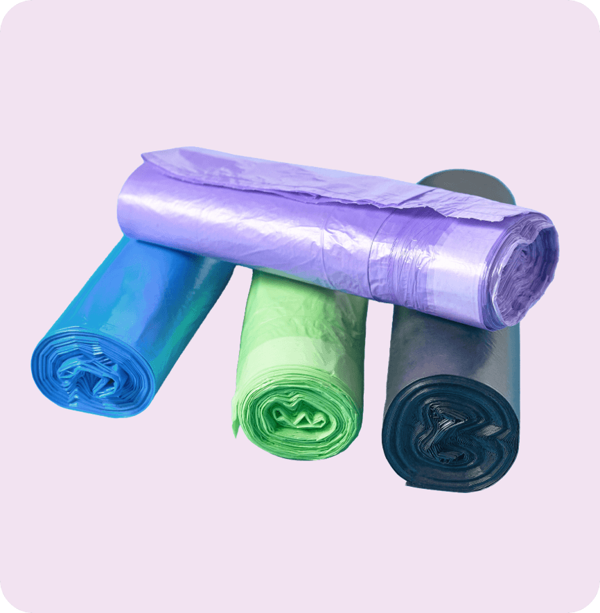 Colorful Trash Bags Multi-colored trash bag rolls.